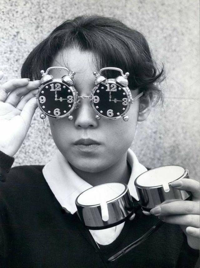 Women with clock on eyes need Computer ReadersScreen Time