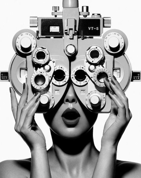 Woman taking eye test for reading glasses