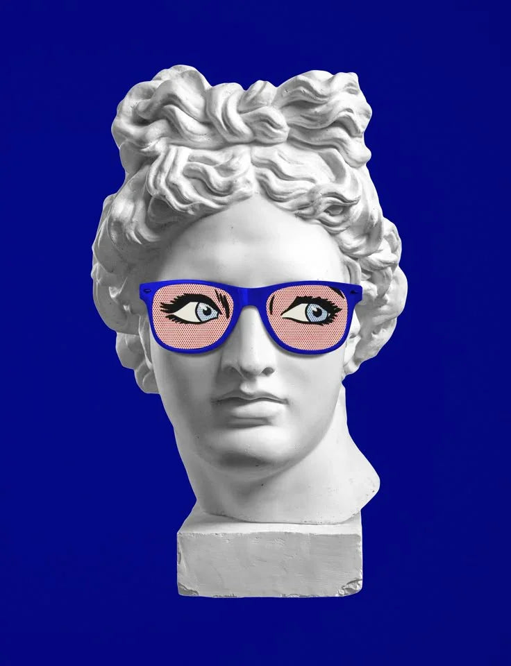 statue of woman's head wearing Glasses