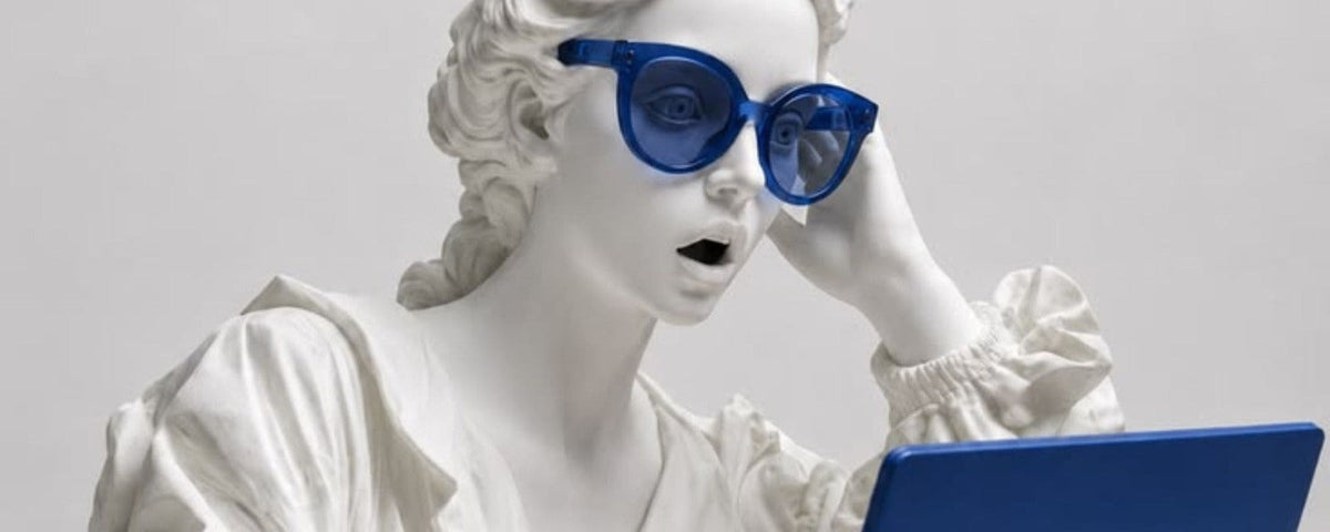 Statue wearing computer glasses