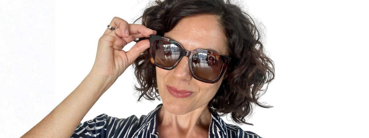 Woman wearing polarised sun readers