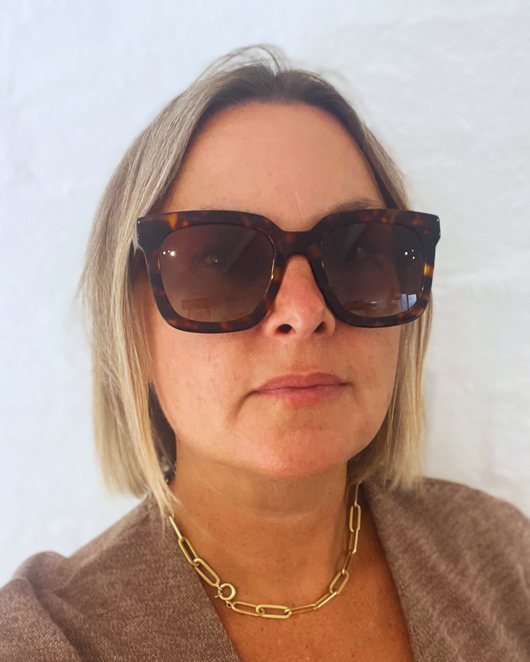 Australian woman wearing Progressive Lens Sun reading glasses with UV protection