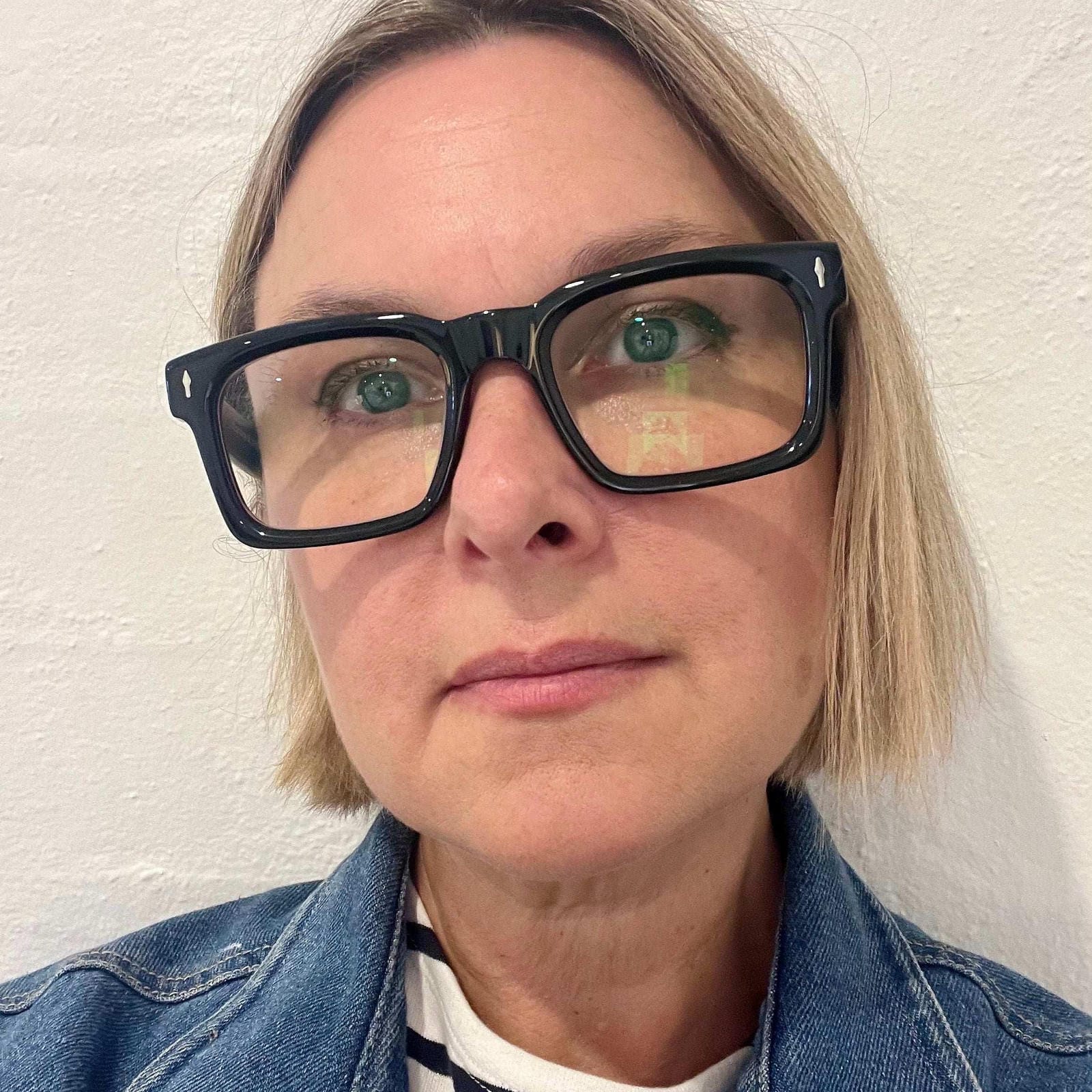 The Nerds - ministry of sight - Australian blonde woman wearing black square reading glasses