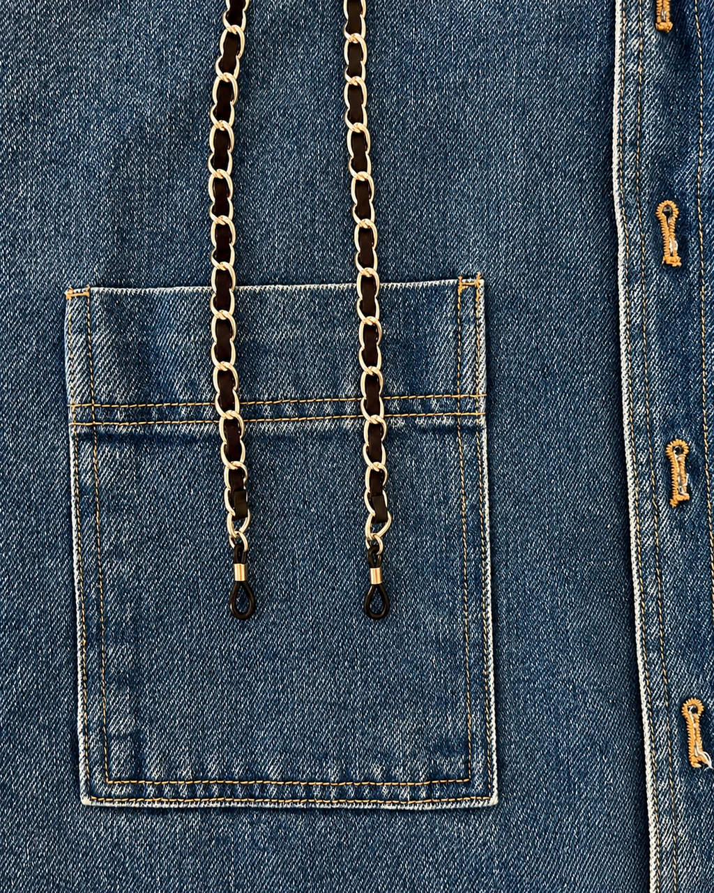 Interwoven metal and fabric chanel inspired glasses chain with stylish round oversized readers from Ministry of Sight on denim jacket