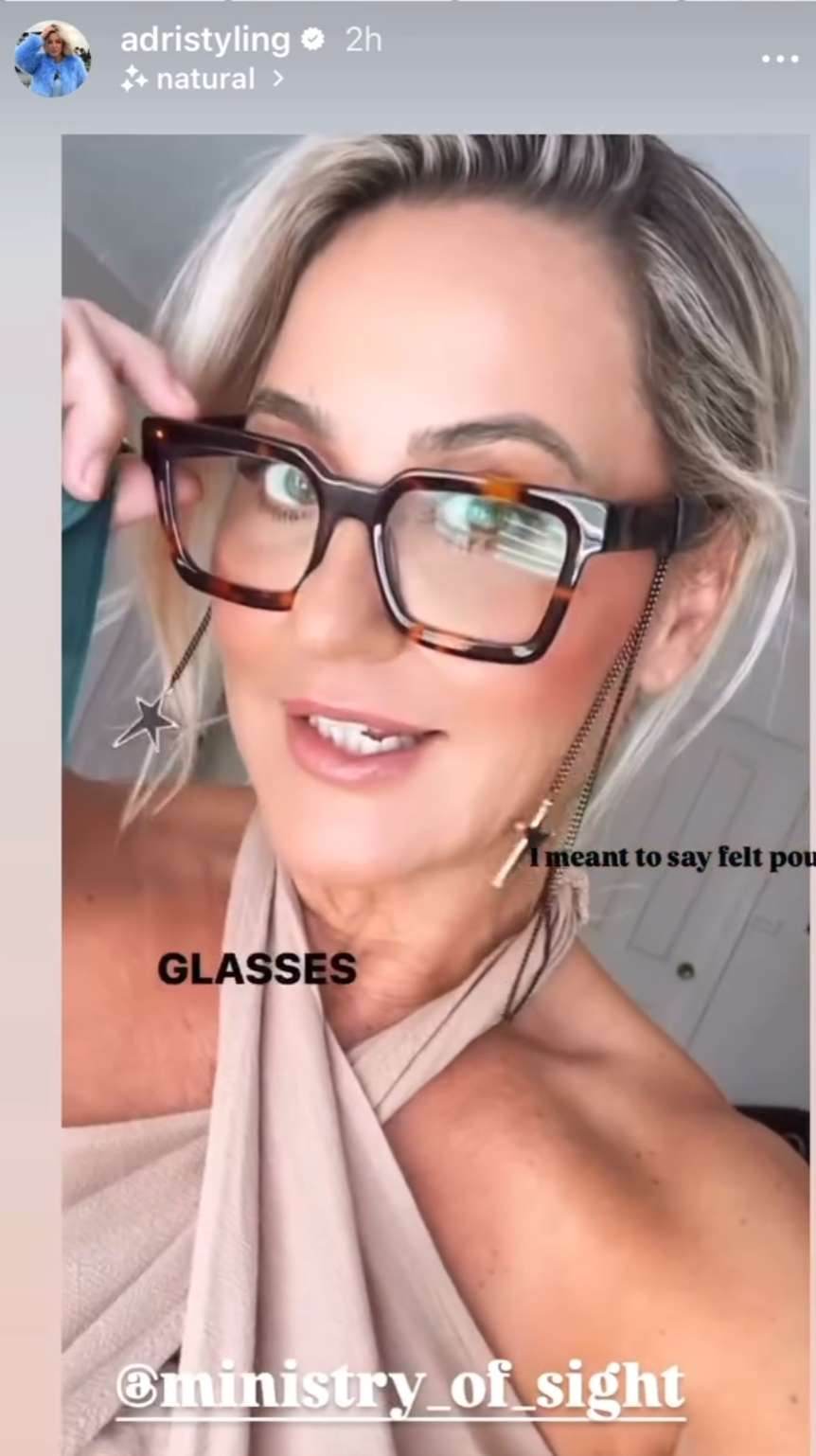 Australian stylist wearing square tortoiseshell reading glasses with rock star metal glasses chain with stars