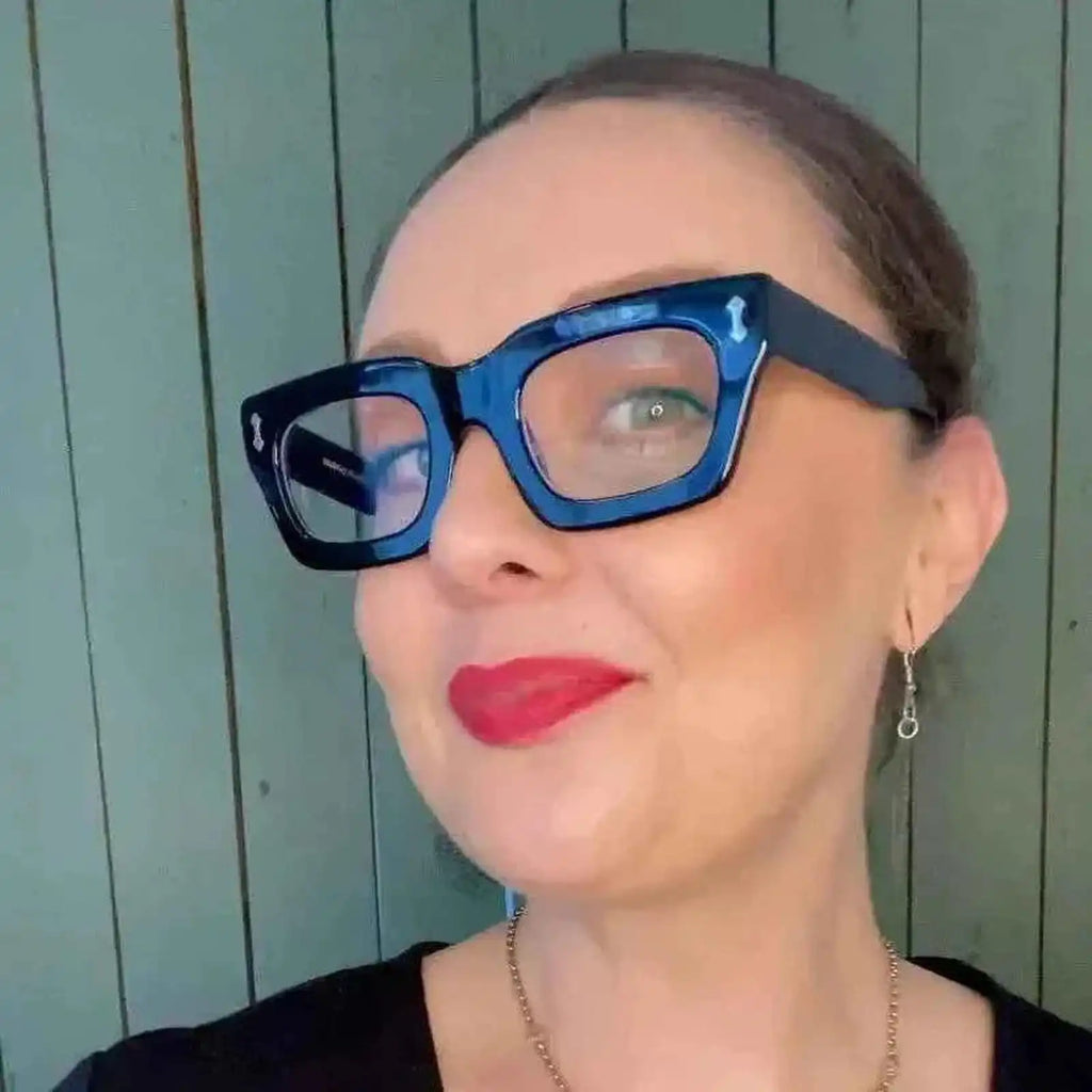 Australian elegant woman over 45 wearing black rectangular readers - ministry of sight reading glasses +2.5