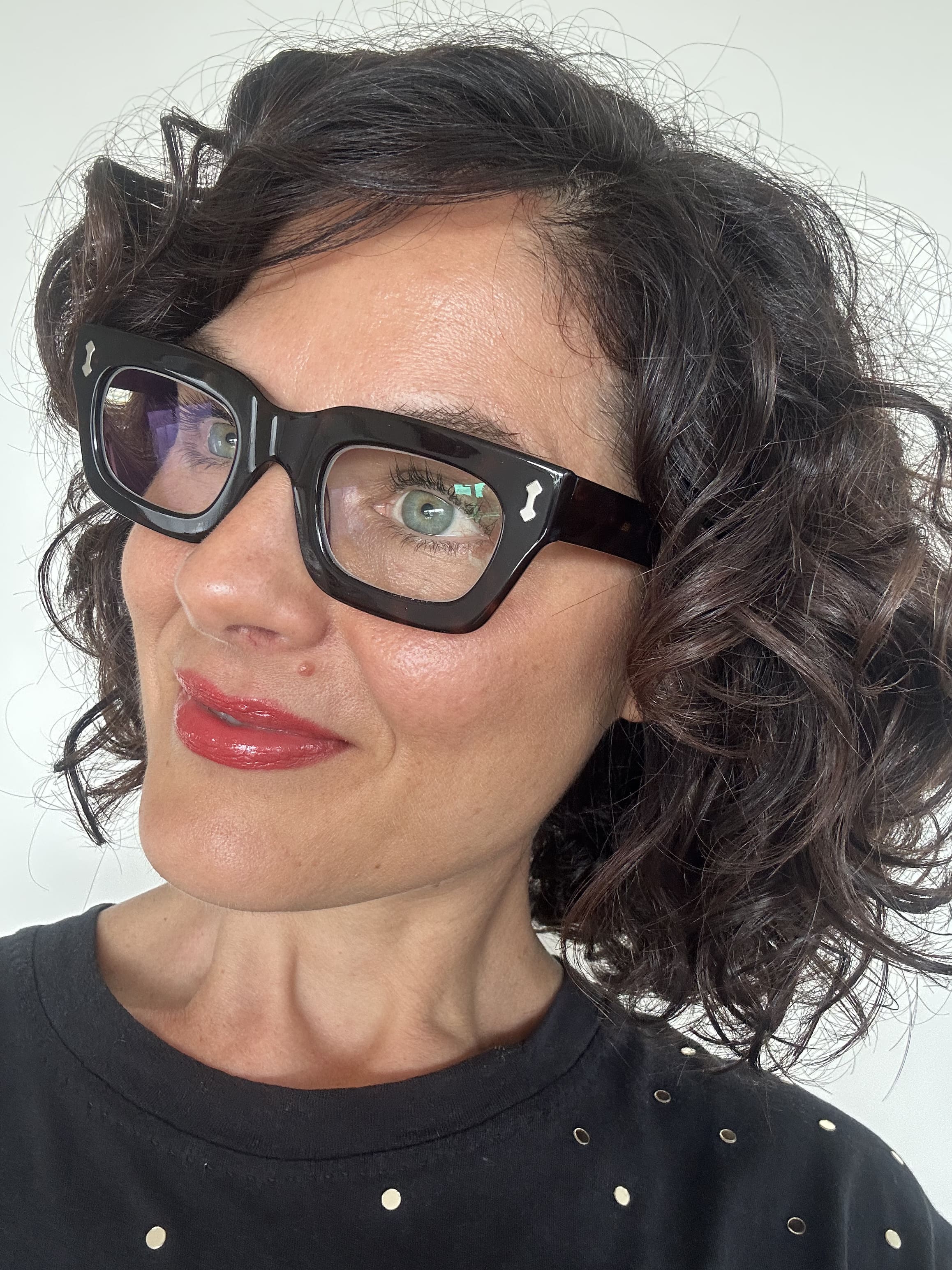 Australian woman wearing tort rectangular readers - ministry of sight reading glasses +0.5 blue-light blocking lenses premium frame