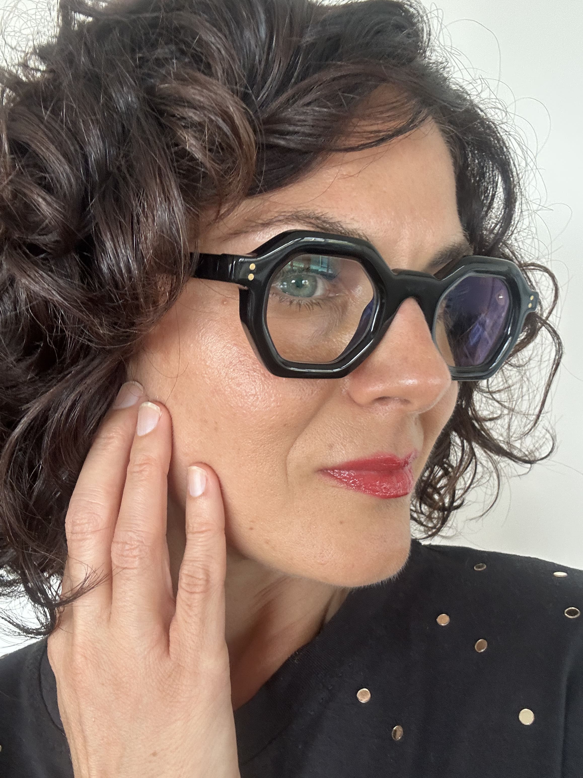 Over 40s woman wearing flattering reading glasses - geometric, black acetate frame - ministry of sight - readers