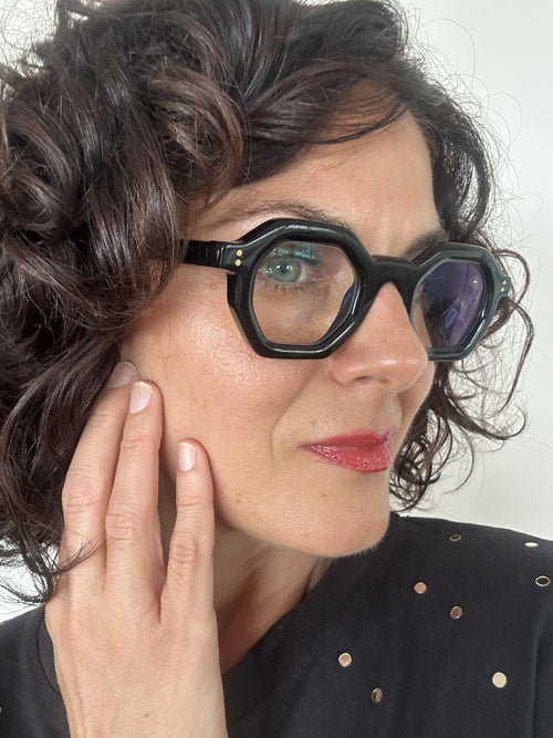 Over 40s woman wearing flattering reading glasses - geometric, black acetate frame - ministry of sight - readers