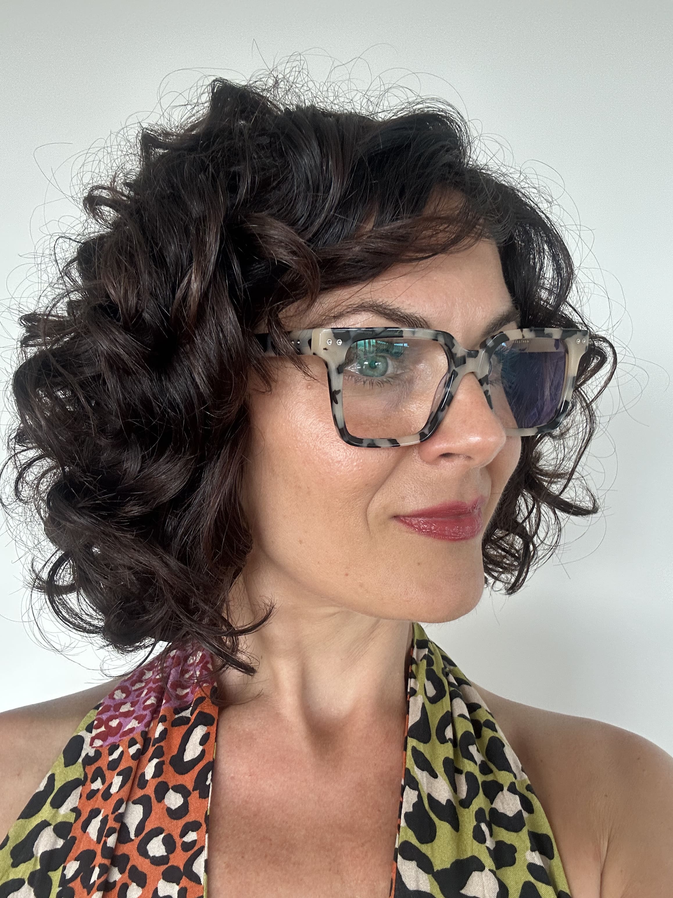 Stylish Australian woman over 40 wearing White and black leopard print acetate frame high quality reading glasses - Ministry of Sight 