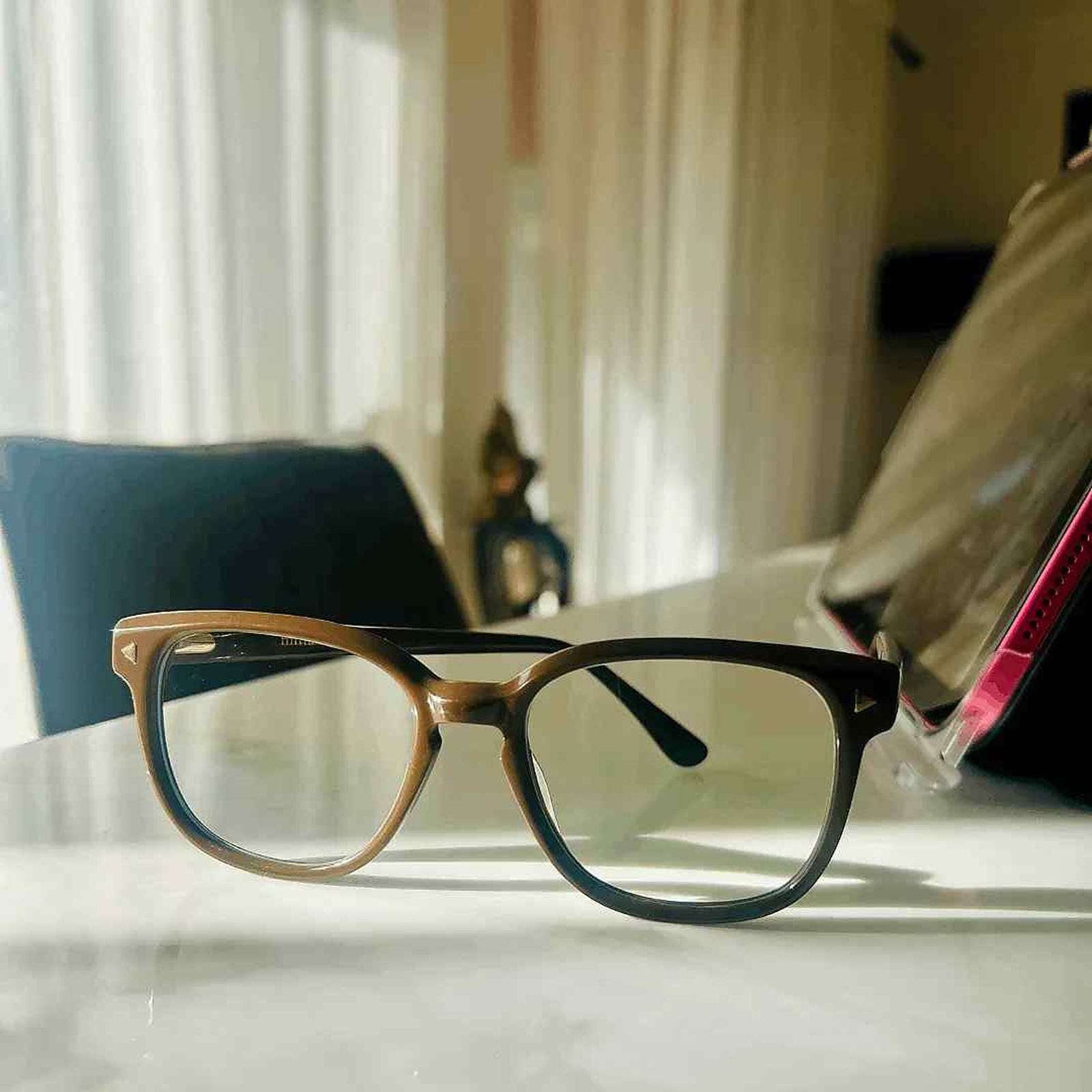 Chocolate brown reading Eyeglasses on a bench - Ministry of Sight stylish readers