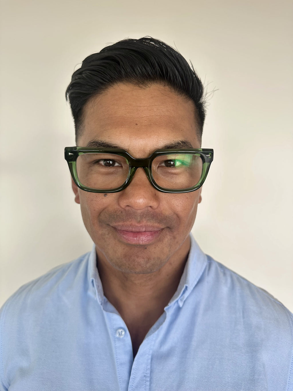 Stylish green reading glasses on an over 40s Australian man - Ministry of Sight readers