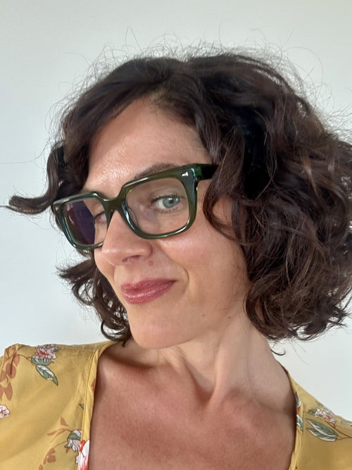 Fashionable green reading glasses on an over 40s Australian woman - Ministry of Sight readers