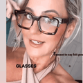 Fashionable woman wearing tortoiseshell square reading glasses and cool glasses chain