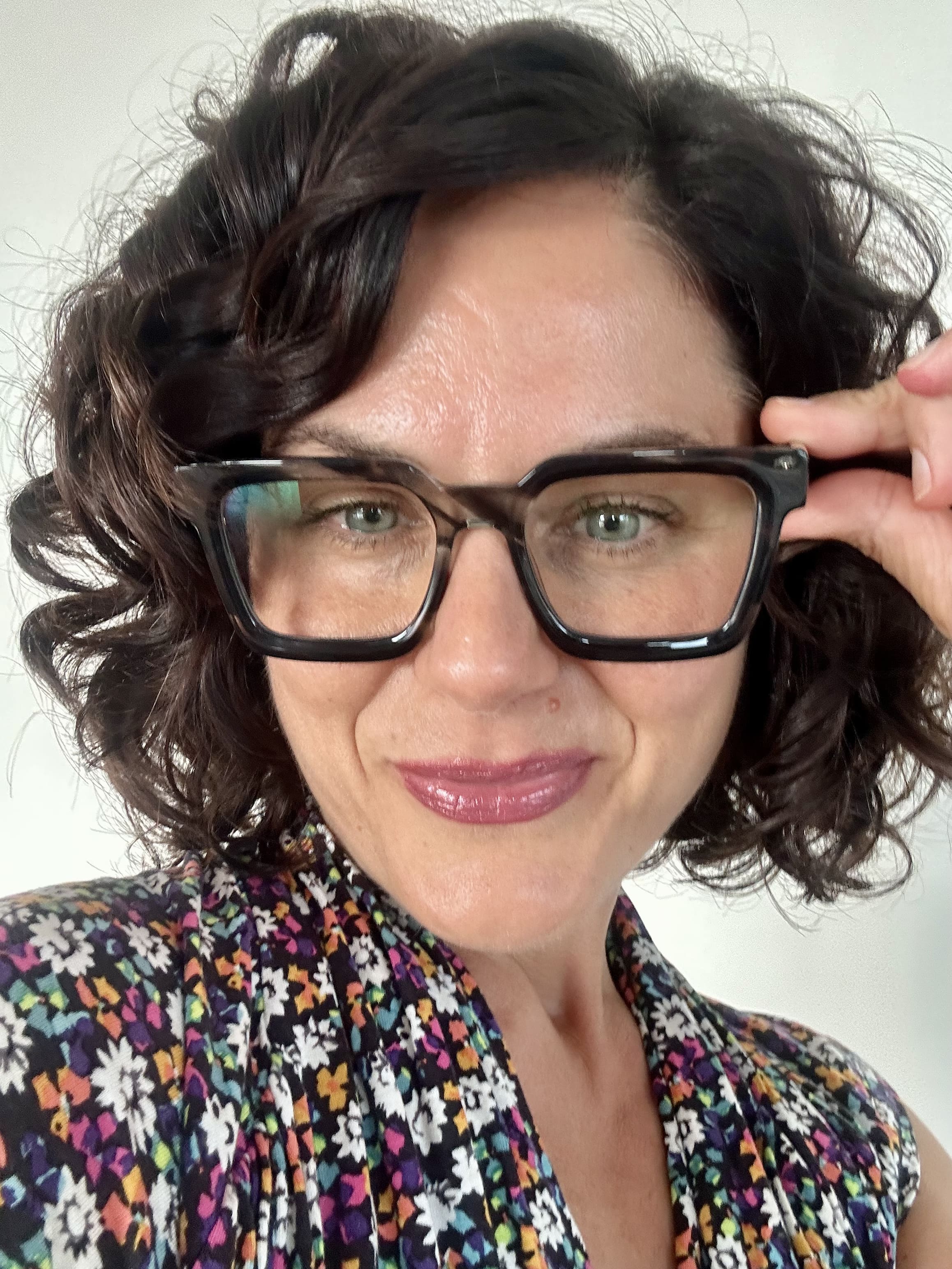 Fun grey marble square reading glasses on an Australian woman over 40 with brown curly hair - Ministry of Sight readers for men and women