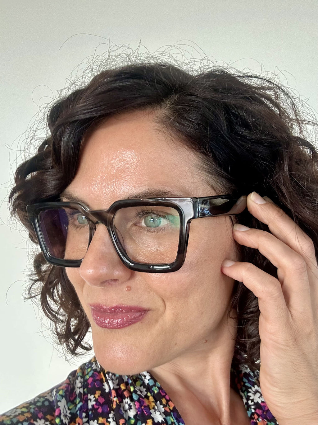 Fun grey marble square reading glasses on an Australian woman over 40 with brown curly hair - Ministry of Sight readers for men and women