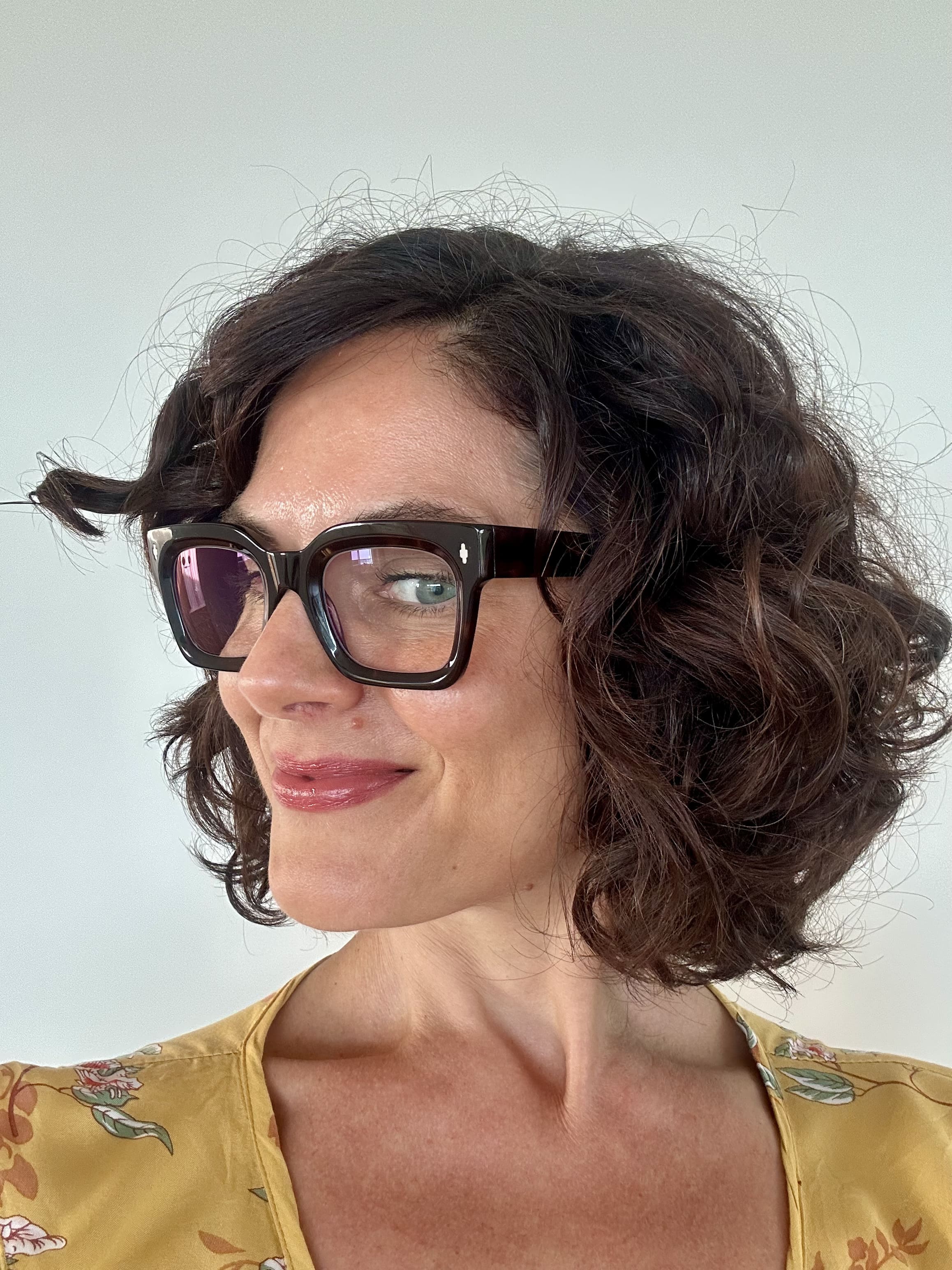 Woman wearing premium luxury black square reading glasses ministry of sight readers