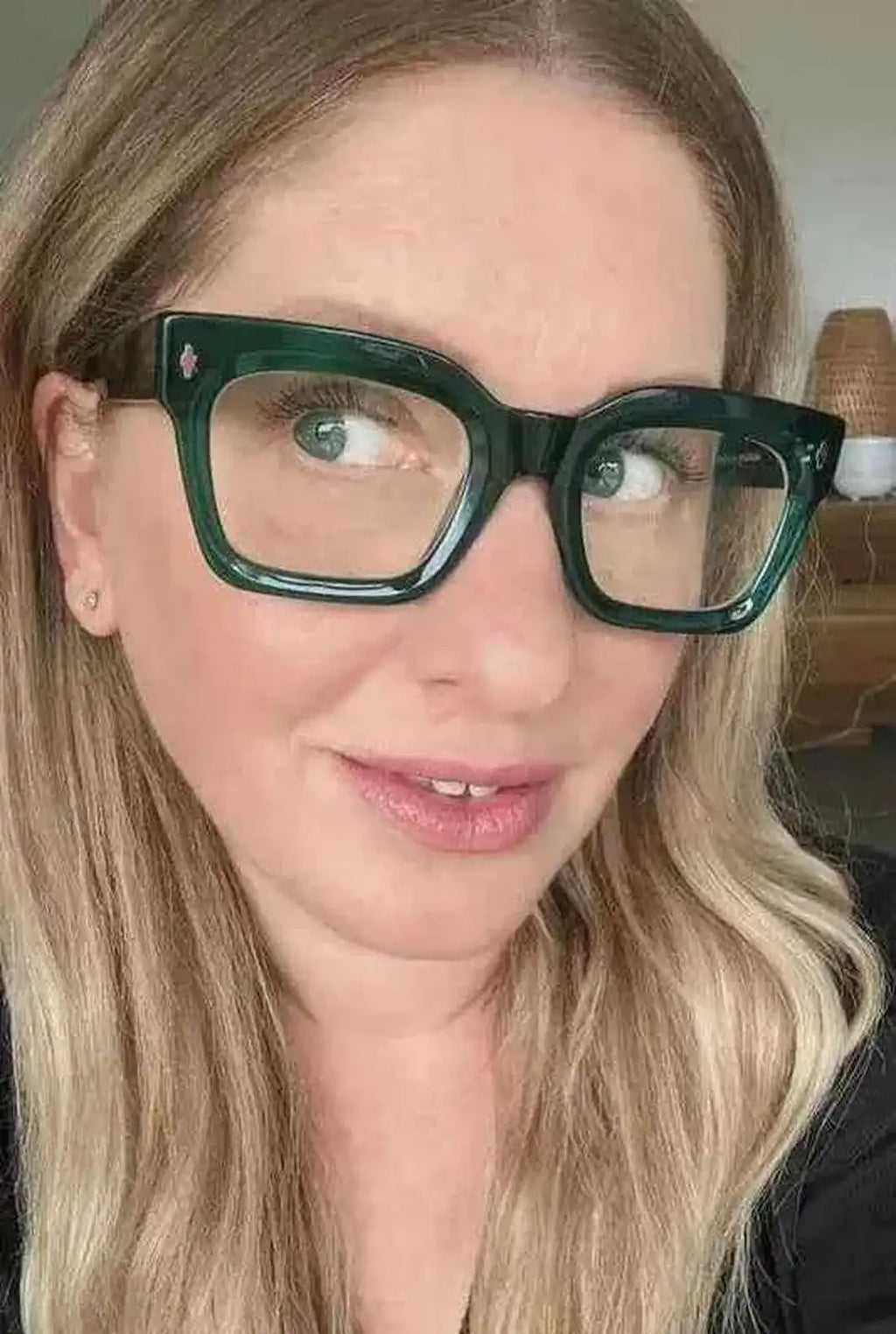 The Standards green reading glasses with natural professional makeup