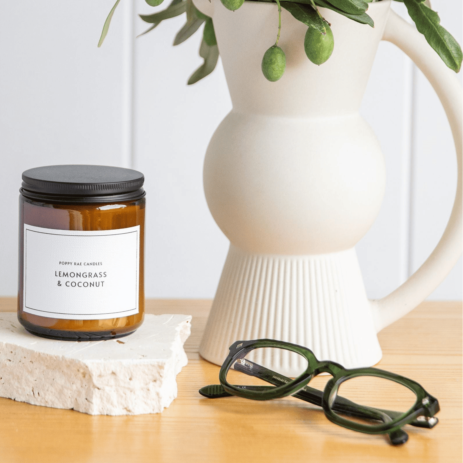 Stylish green vintage reading glasses on bedside table in Australia