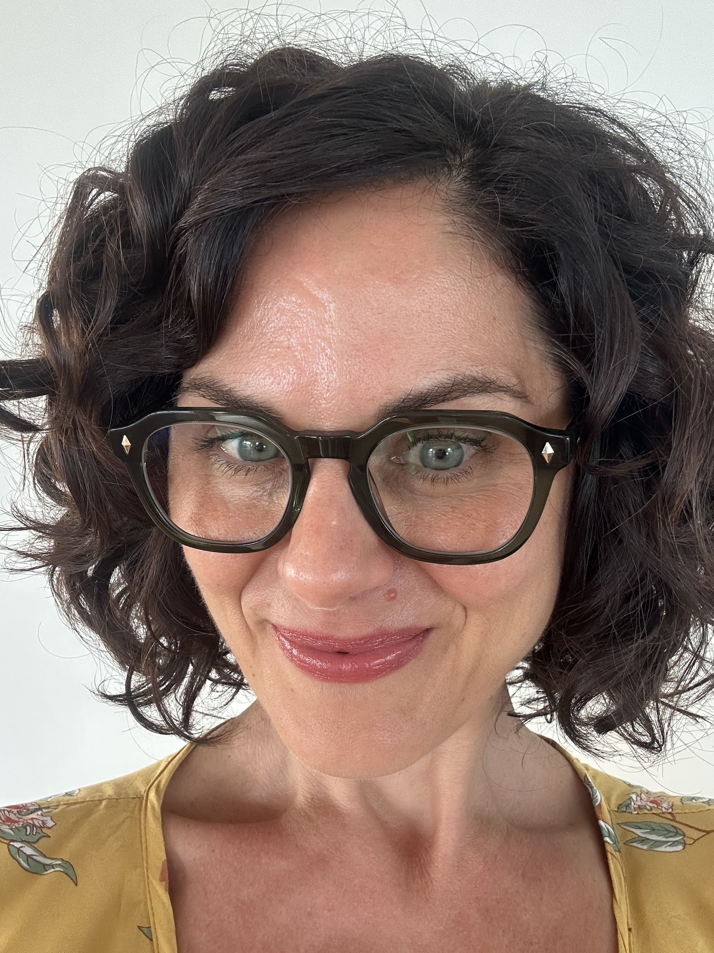 Beautiful woman over 40 years old wearing The Vintage ministry of sight - flat top reading glasses - green readers - ministry of sight