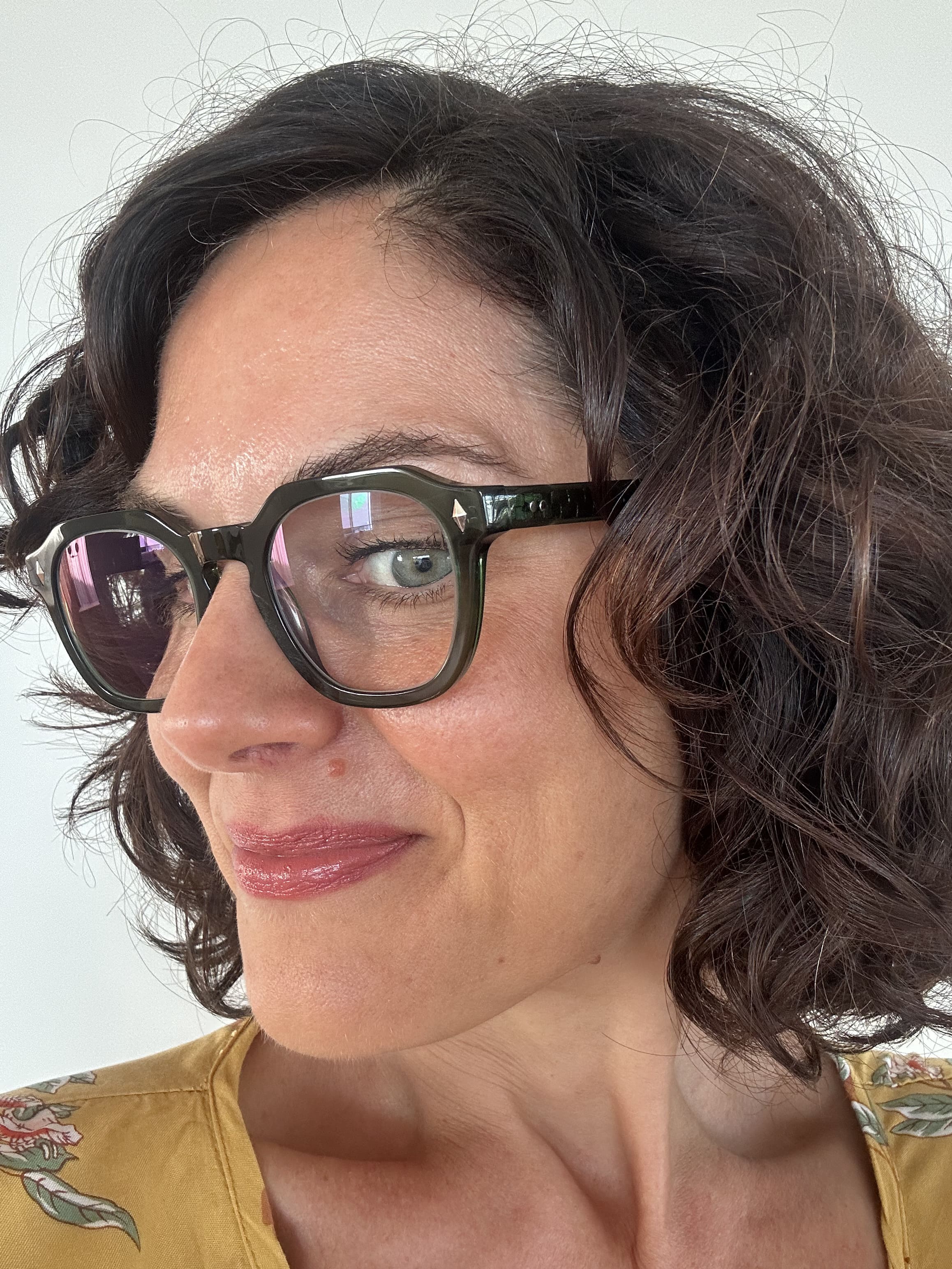 Beautiful woman over 40 years old wearing The Vintage ministry of sight - flat top reading glasses - green readers - ministry of sight