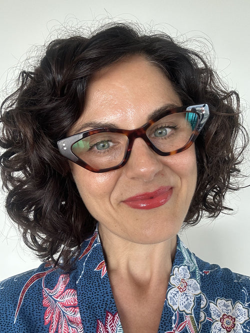 Stylish Australian woman wearing cat-eye tortoiseshell reading glasses - Ministry of Sight readers