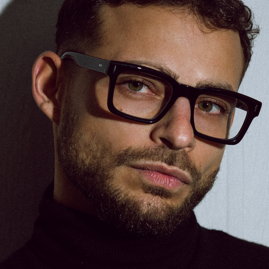Australian Man wearing stylish black square glasses