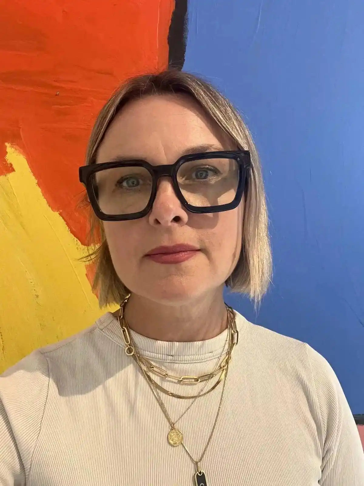 Australian woman wearing navy blue square reading glasses - Ministry of Sight - The Square readers