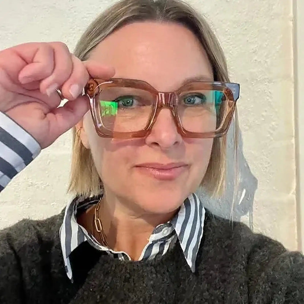 Australian woman with blonde hair and blue eyes wearing cool taupe pink neutral square reading glasses Ministry of Sight