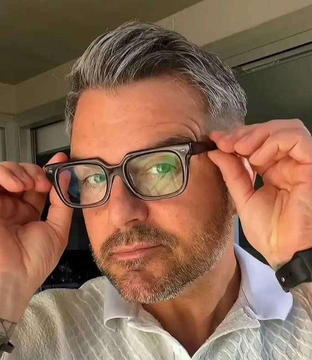 Australian stylish man wearing grey reading glasses
